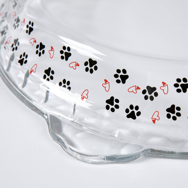 Glass pie plate with black paw prints and red hearts pattern