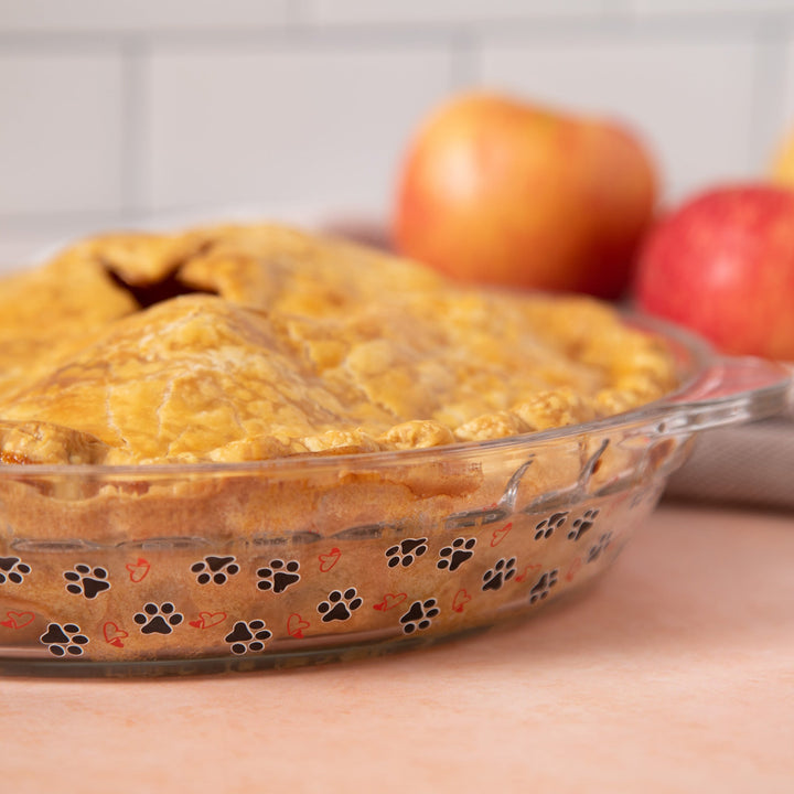 Amber glass pie plate with paw-print pattern on the side wall