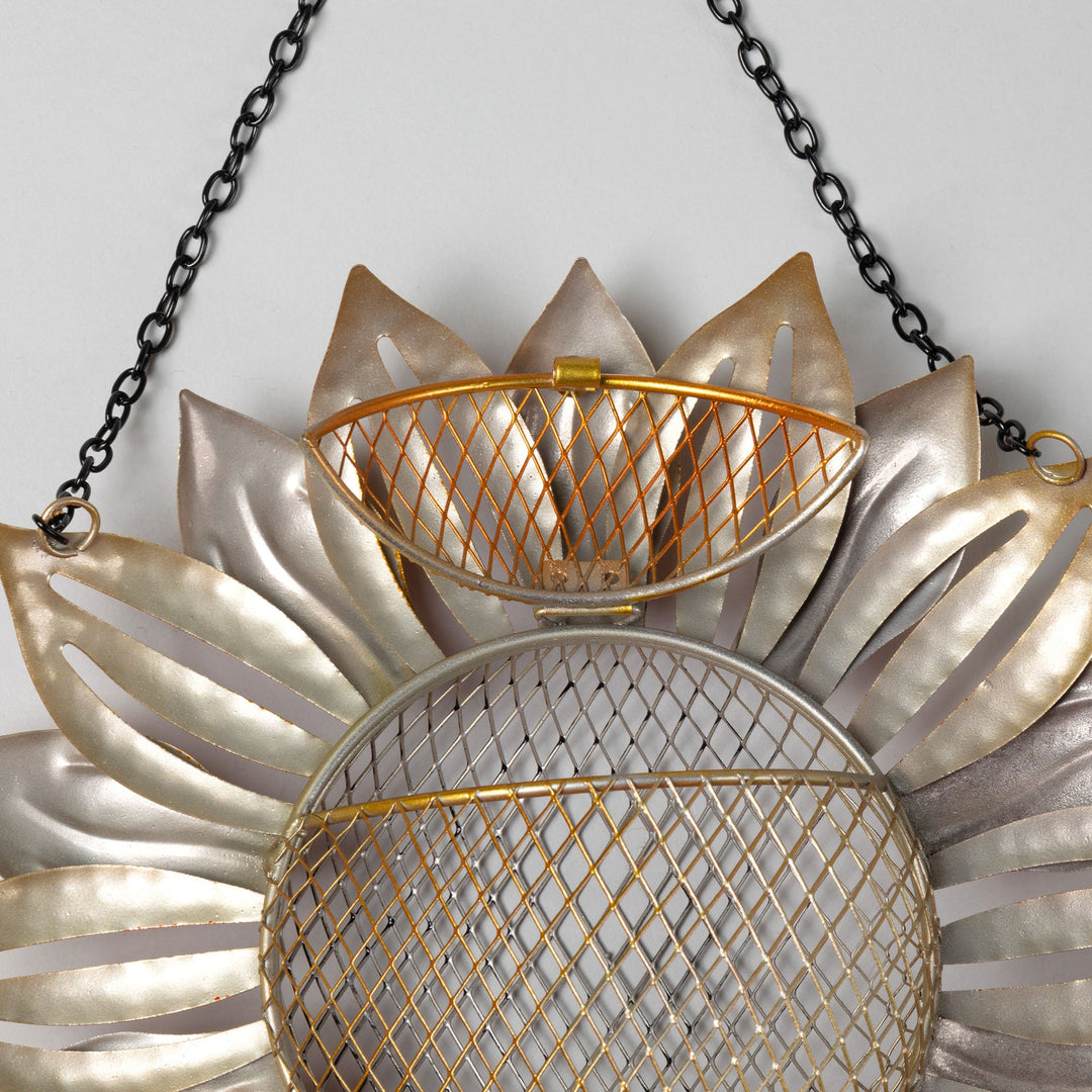Hanging sunflower mesh bird feeder with silver petals and wire mesh seed baskets