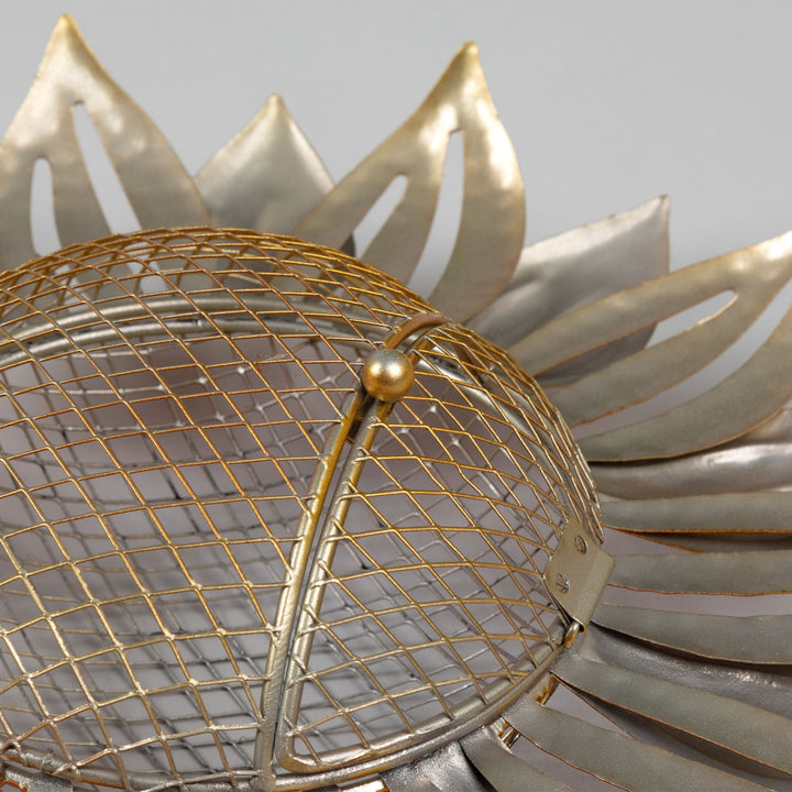 Metal wire mesh seed dome with sunflower petals and small clasp detail