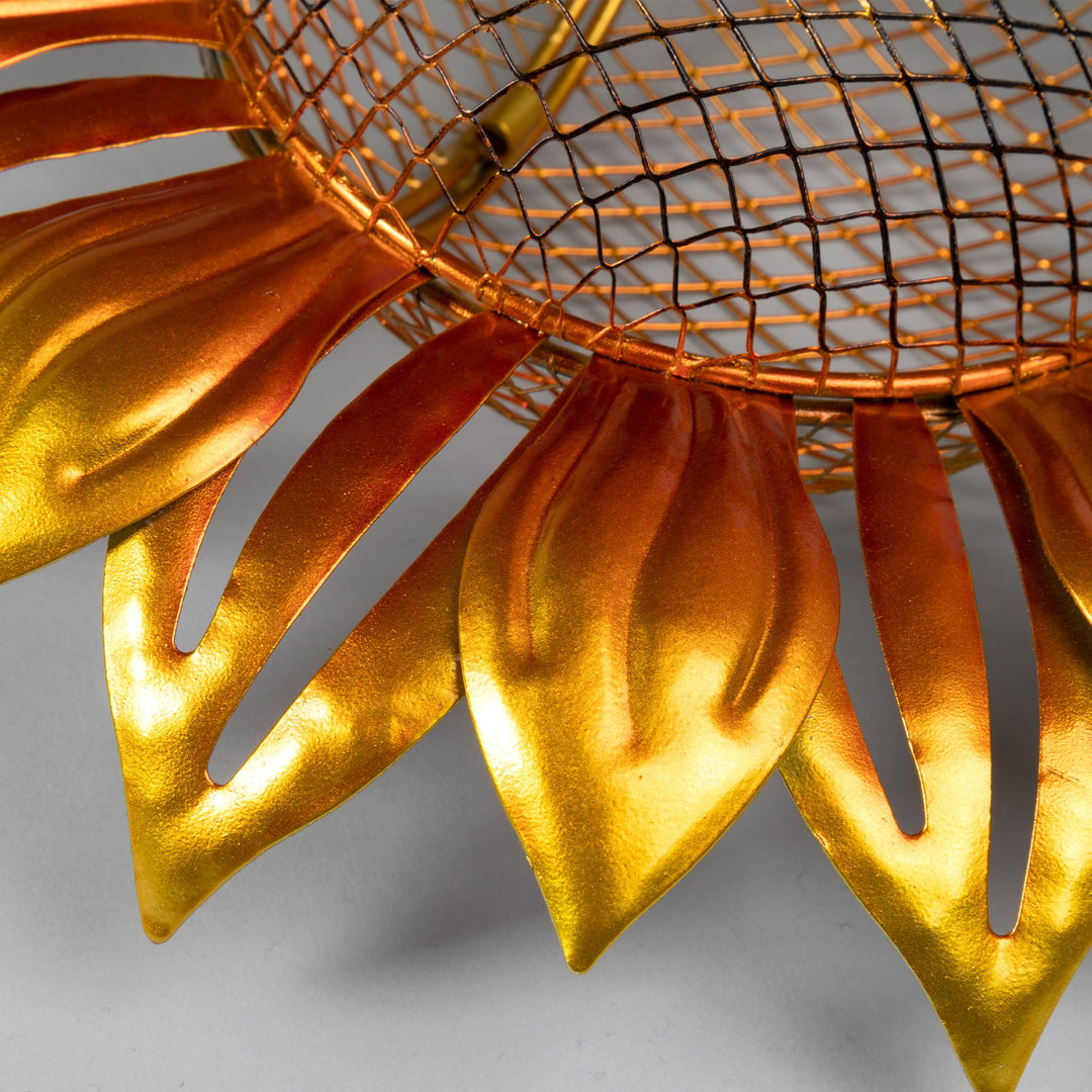 Hanging sunflower bird feeder with gold-toned metal petals and mesh canopy