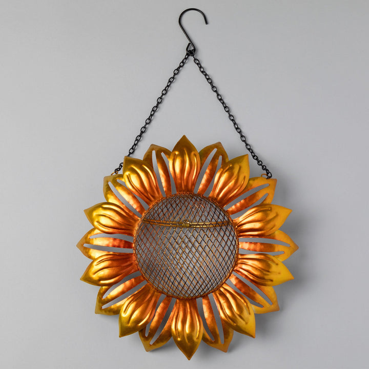 Hanging sunflower mesh bird feeder with golden petals and round wire mesh seed core