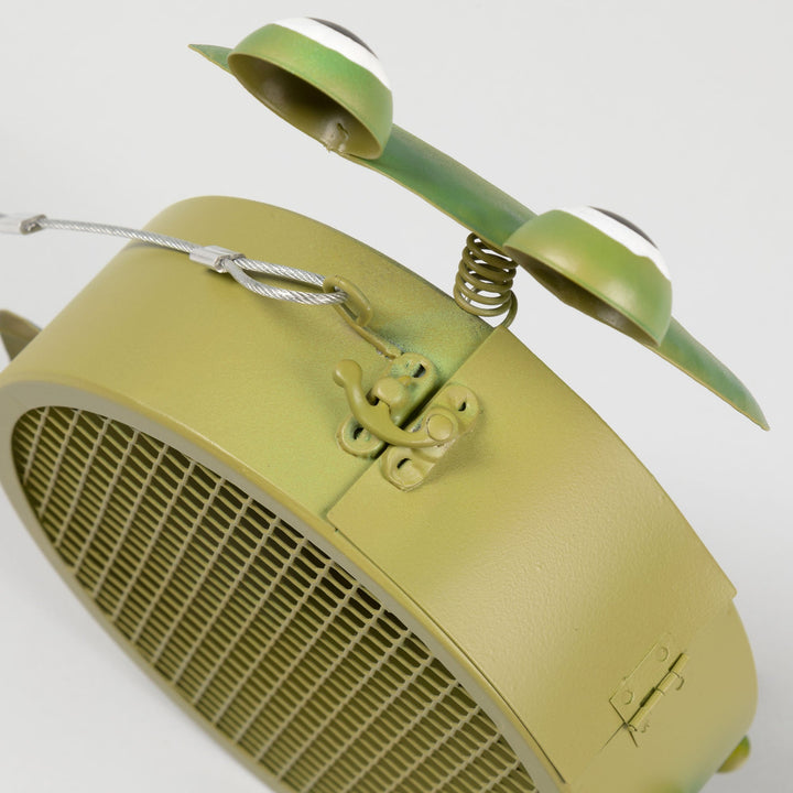 Close-up of yellow-green frog bird feeder top with hanging loop and mesh