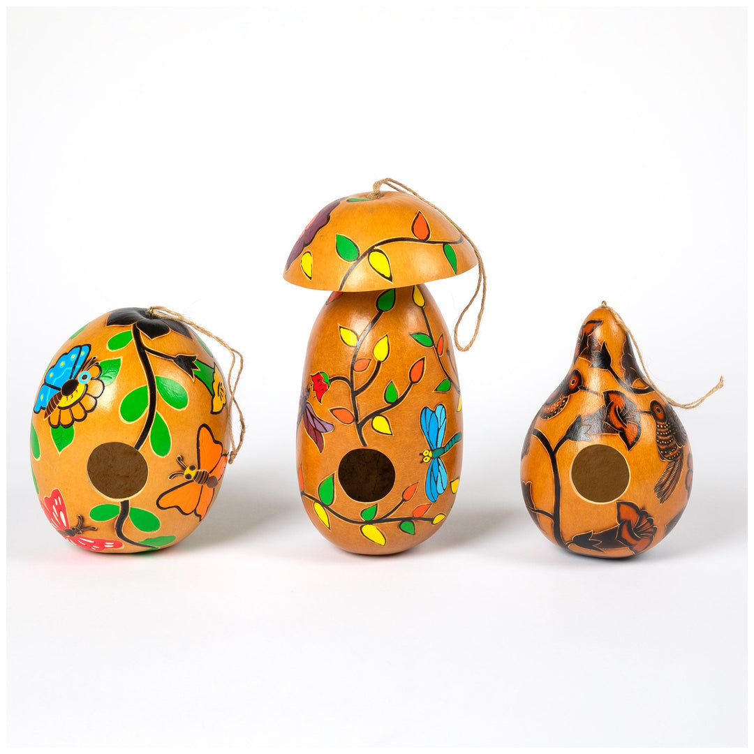 Hand-painted gourd birdhouses set with colorful butterfly and leaf designs