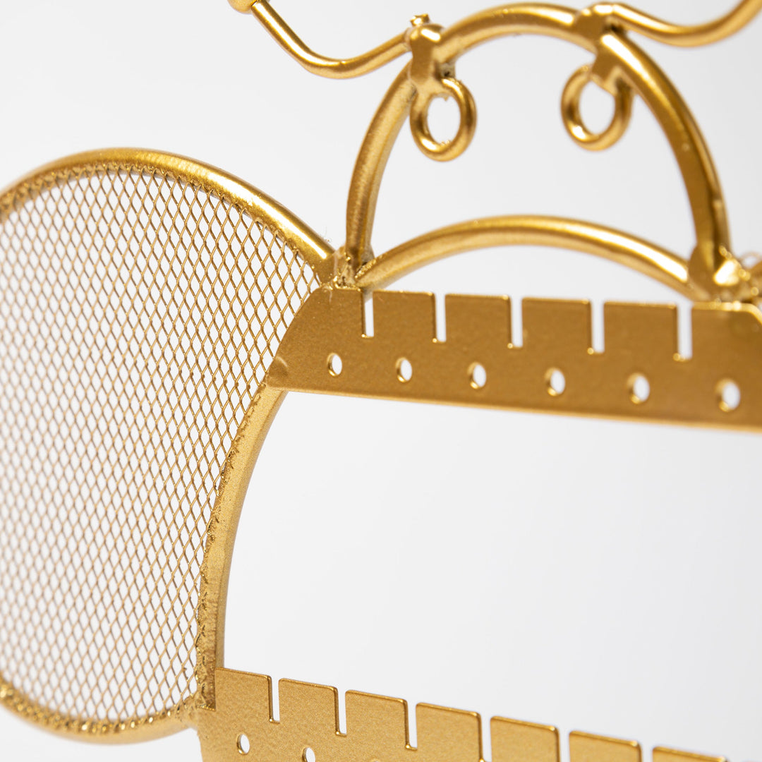 Gold-tone crown support and mesh panel with curved hanging hooks.