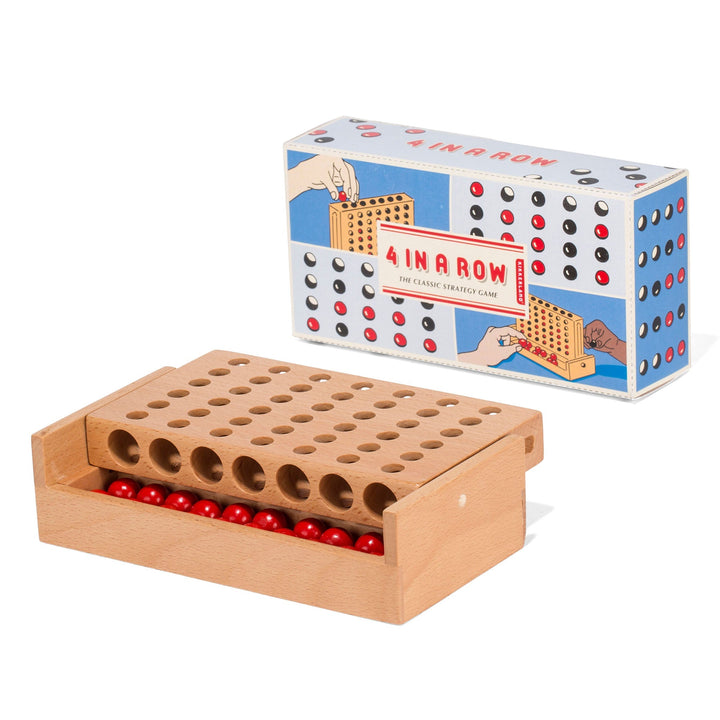 Wooden peg board strategy game with red and black pieces and cardboard product box