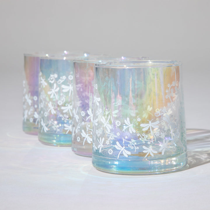 Set of 4 iridescent glass candle holders with white snowflake-vine pattern on blue base