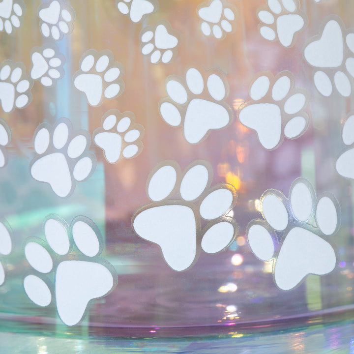 Iridescent glass candle holder with white paw-print decals, rainbow iridescent base