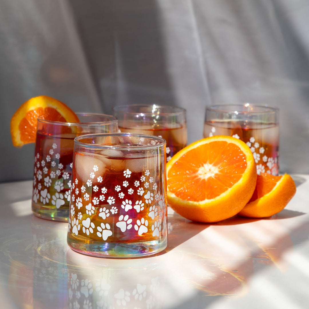 Iridescent glass tumbler set of 4 with white paw-print pattern