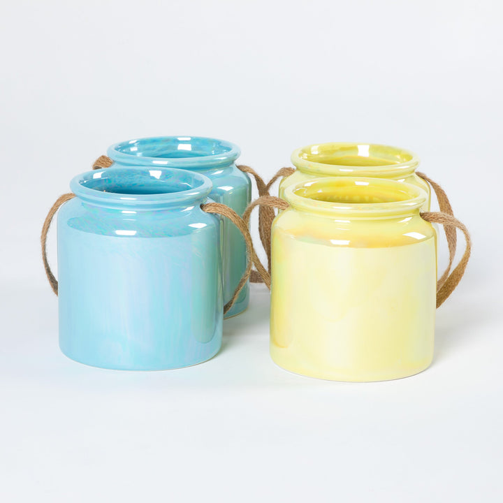 Set of 2 blue and cream paw-print glass candle holders with rope handles