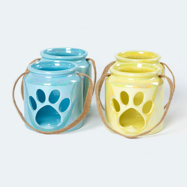 Set of 2 blue and cream paw-print glass candle holders with rope handles