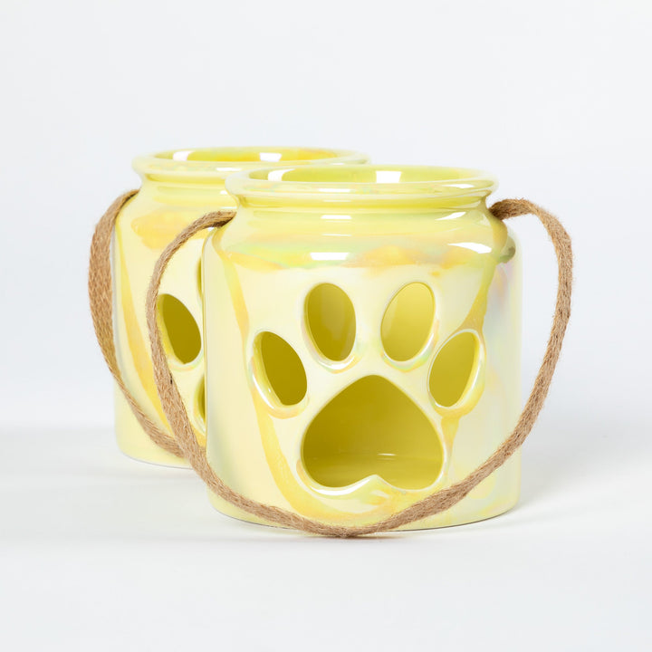 Set of 2 cream paw-print glass candle holders with rope handles