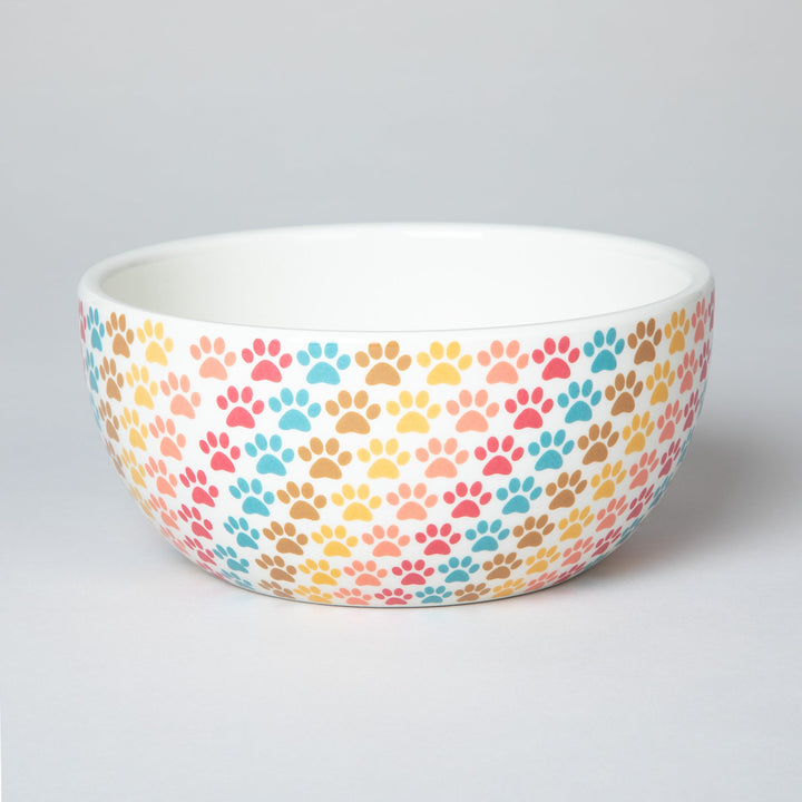 Ceramic soup or salad bowl in pastel multicolor paw-print pattern