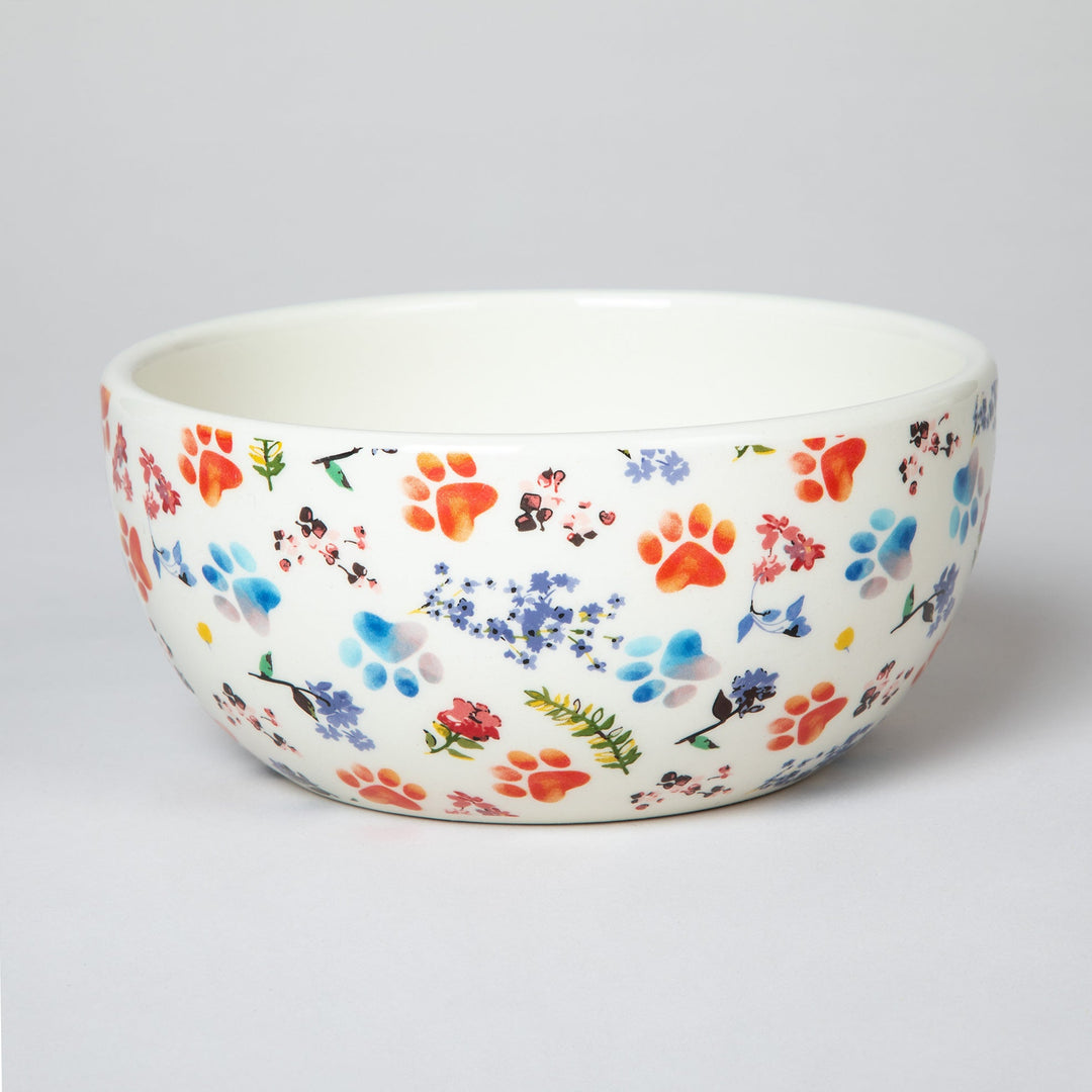 Ceramic soup bowl with multicolor paw, floral, and leaf pattern