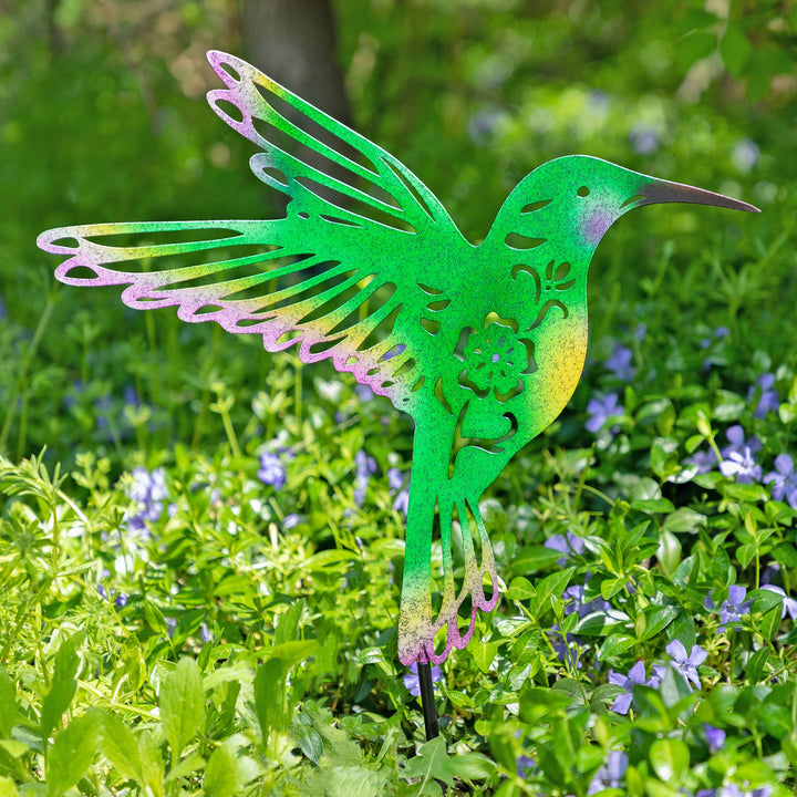 Green hummingbird garden stake silhouette with iridescent accents and black metal stem