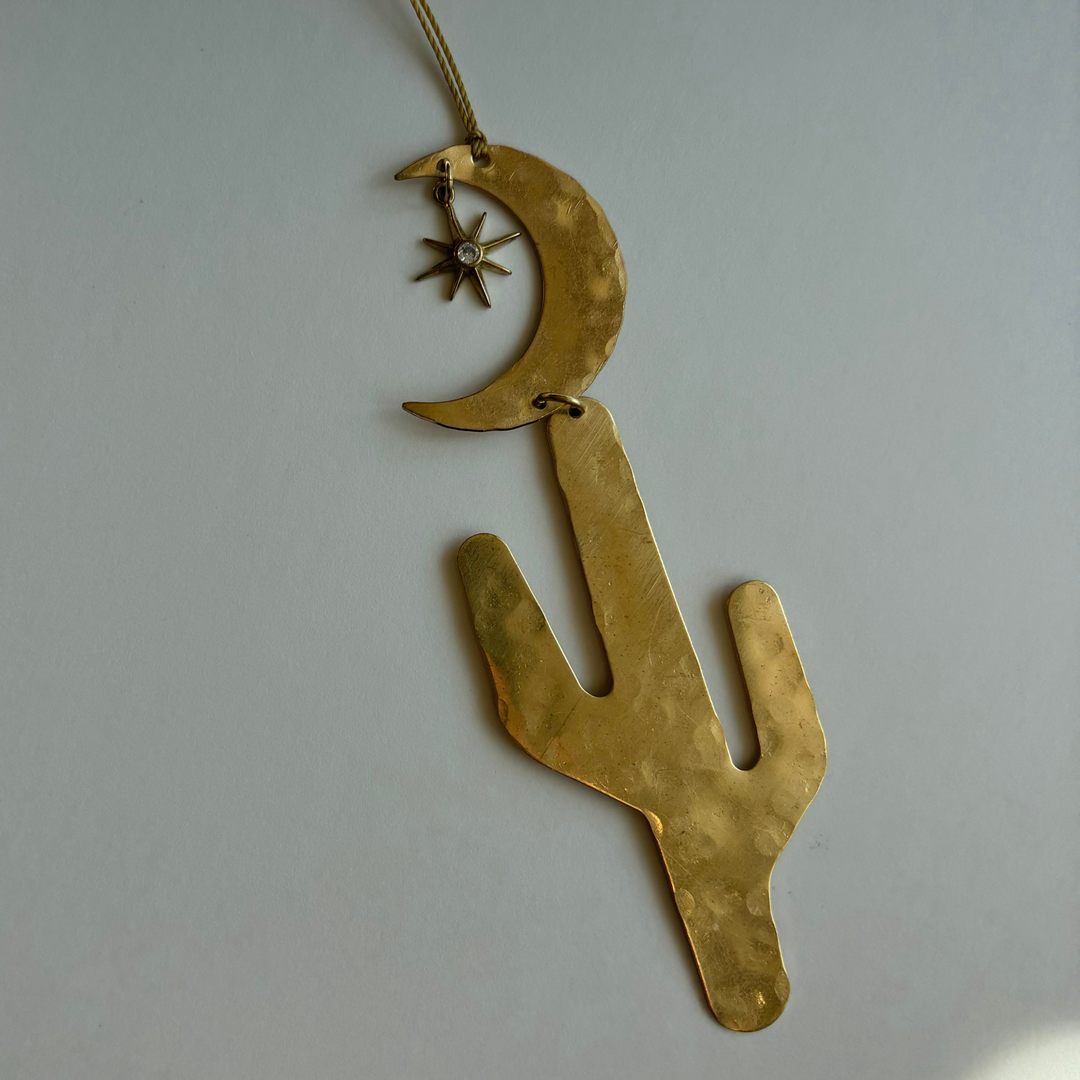 Gold-tone crescent moon and star ornament with hanging string