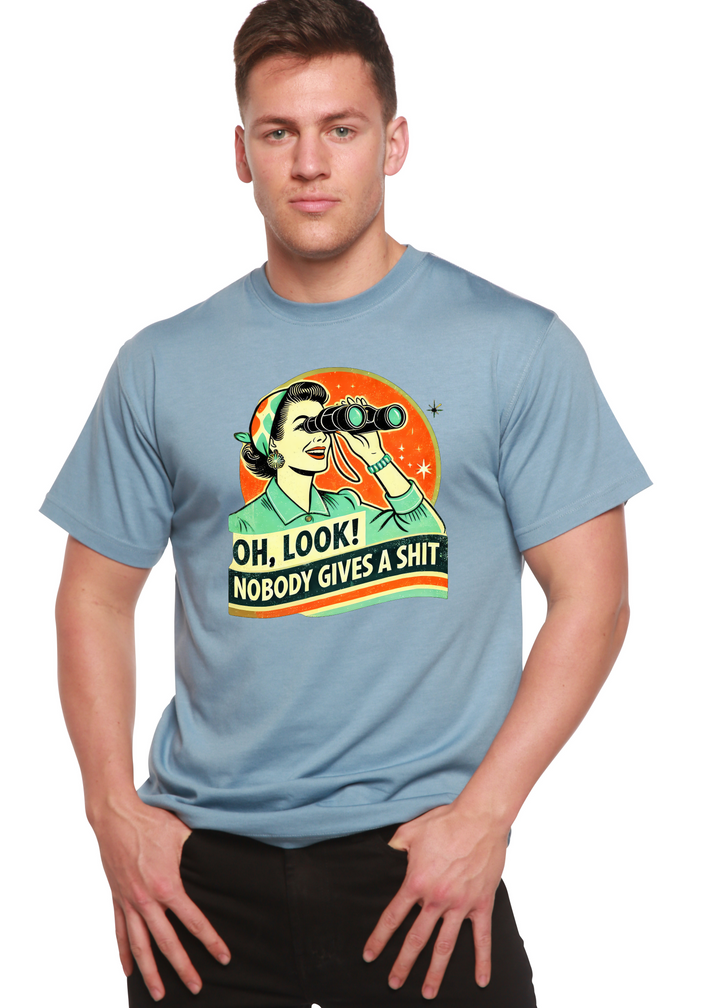 Light blue unisex graphic T-shirt with retro woman holding binoculars.