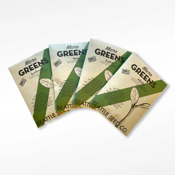 Set of Micro greens seed packets, Seattle Seed Co., shown fanned on surface