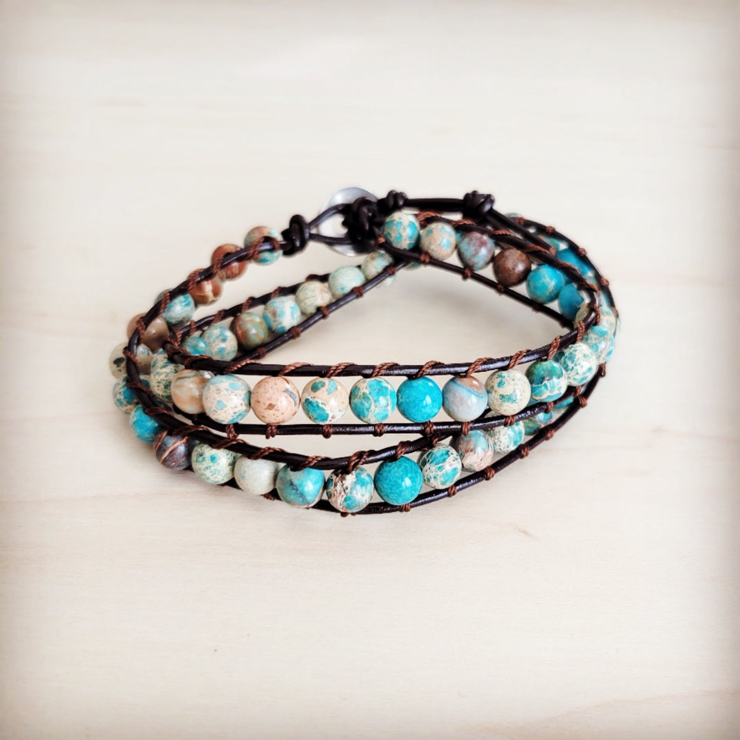 Beaded leather double-wrap bracelet with turquoise and white stone-look beads on black cords