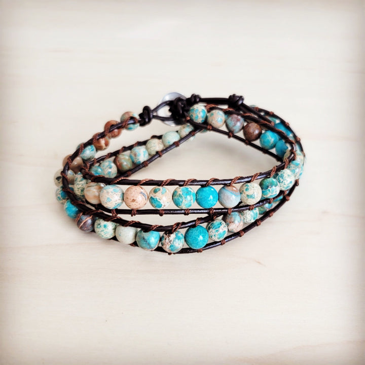 Beaded leather double-wrap bracelet with turquoise and white stone-look beads on black cords