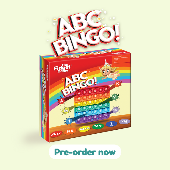 ABC Bingo board game box with rainbow number grid and token launcher artwork