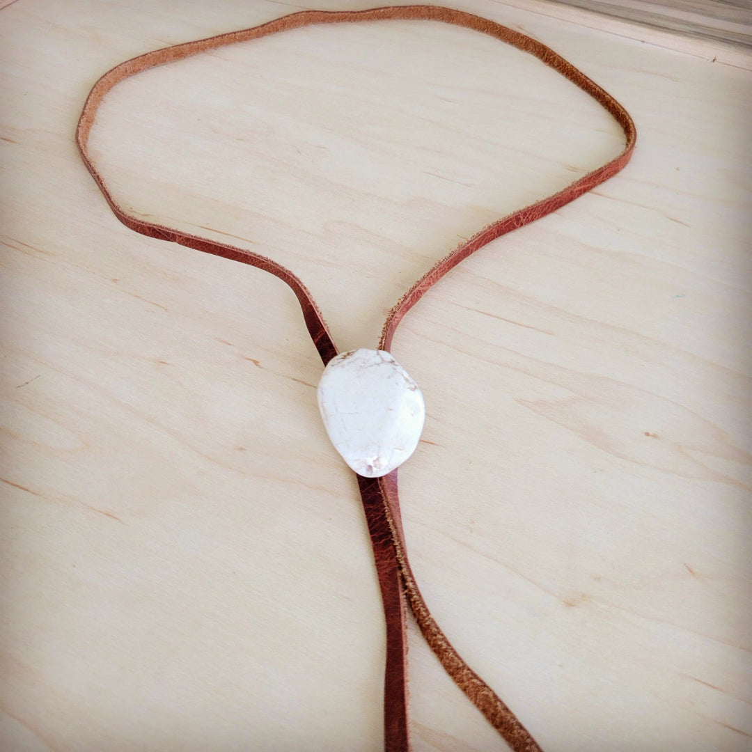 Leather lariat necklace with white oval turquoise slab center pendant and brown cord