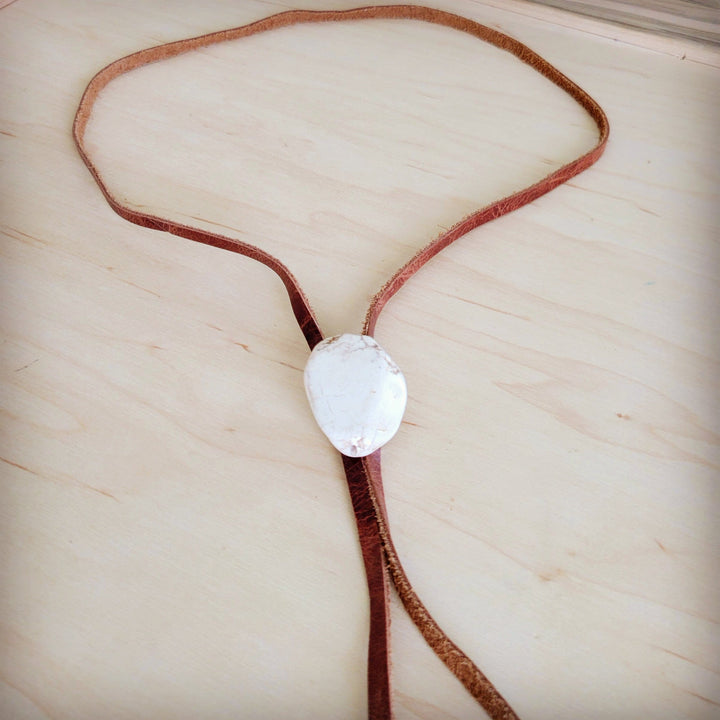 Leather lariat necklace with white oval turquoise slab center pendant and brown cord