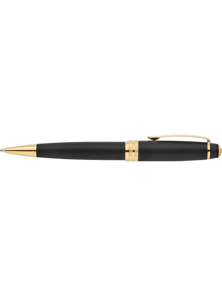 Matte black ballpoint pen with gold bands and side clip, side view
