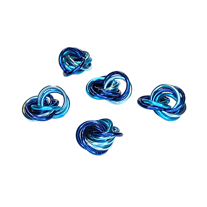 Möbii fidget balls, five blue knot balls in mixed shades