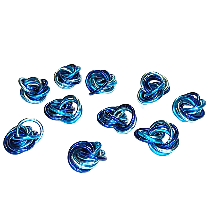 Set of metallic blue Möbius fidget balls