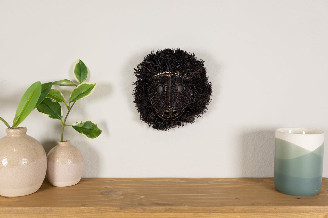 Round spiky black howler monkey wall or table display mask