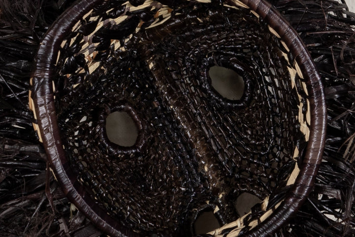 Woven monkey face mask with two eye openings, dark brown-black mesh