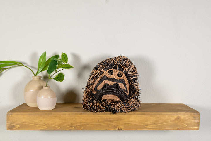 Spider monkey face mask with full head fringe, tan face panels, and dark accent stitching