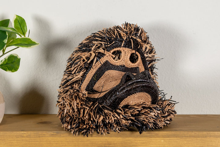 Spider monkey face mask 3/4 angle with layered black-and-tan woven sections