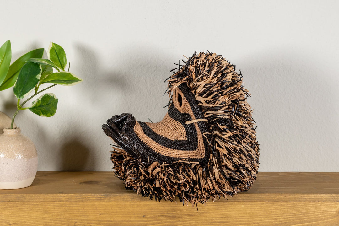 Spider monkey face mask side view with black snout and tan stitched muzzle panel