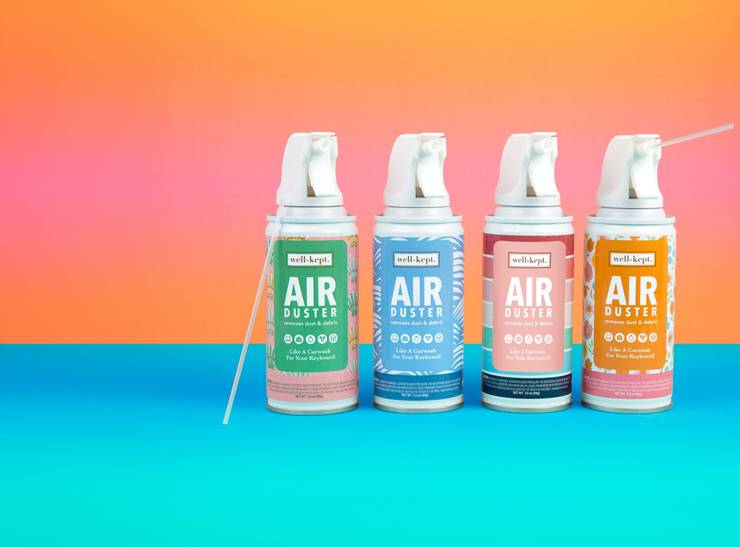 Set of mini compressed air duster cans with straw nozzles; well-kept pastel labels.