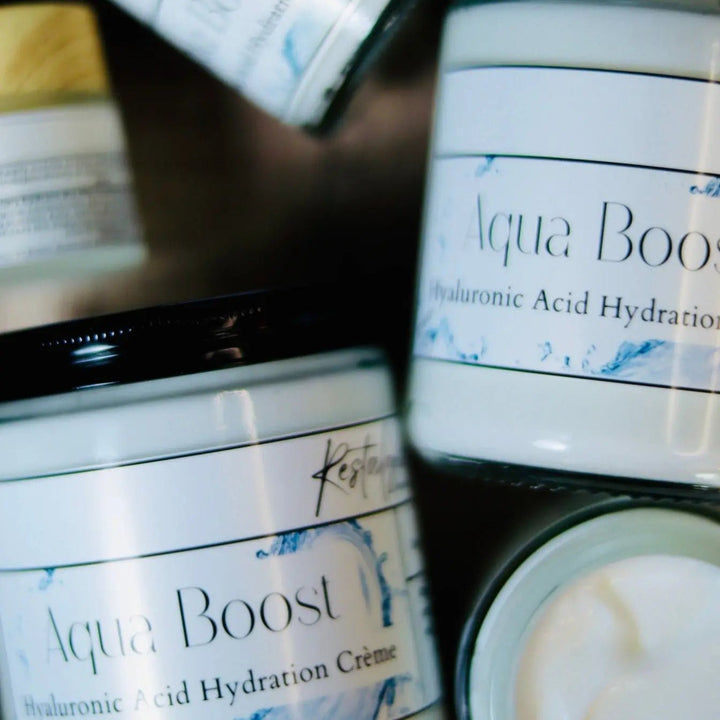 Aqua Boost Hyaluronic Acid Hydration Crème jars in multiple sizes