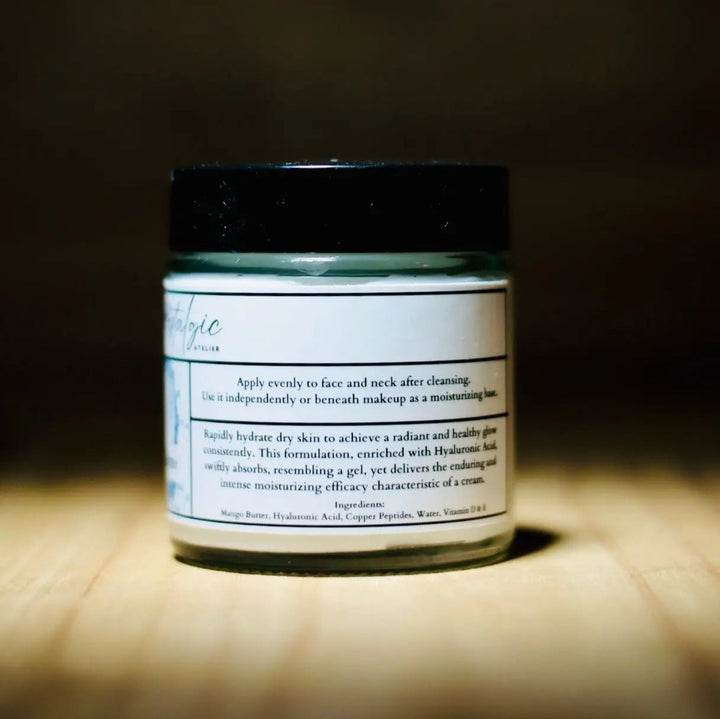 Hydration face cream in a clear jar with black lid and white label