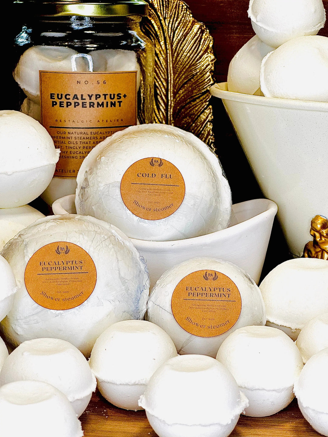 White eucalyptus peppermint shower steamer discs in a bowl
