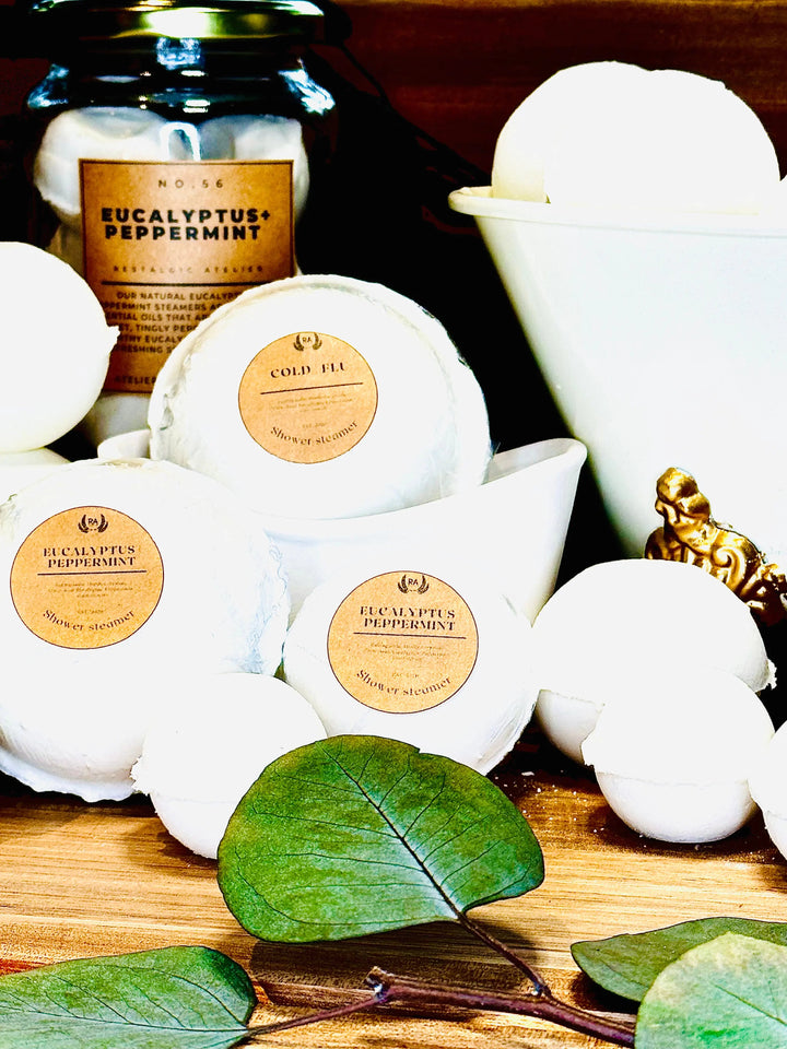 Eucalyptus peppermint shower steamer discs with green leaves