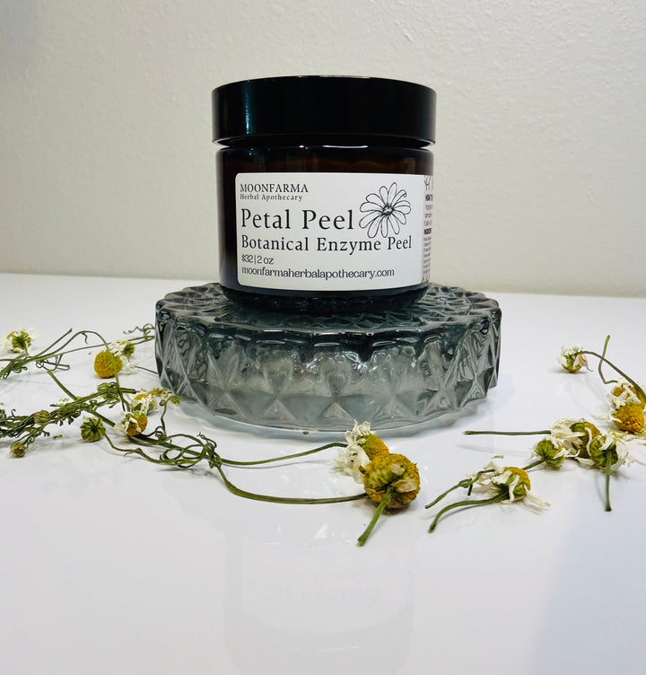 Botanical enzyme peel jar on textured base with black lid