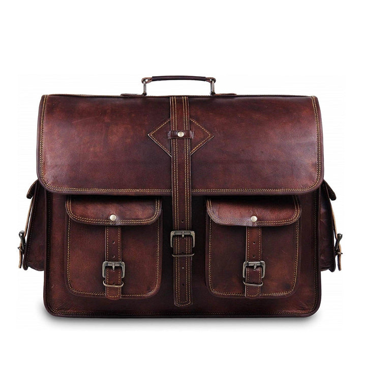 Brown leather briefcase with top handle, front flap, and two zip pockets