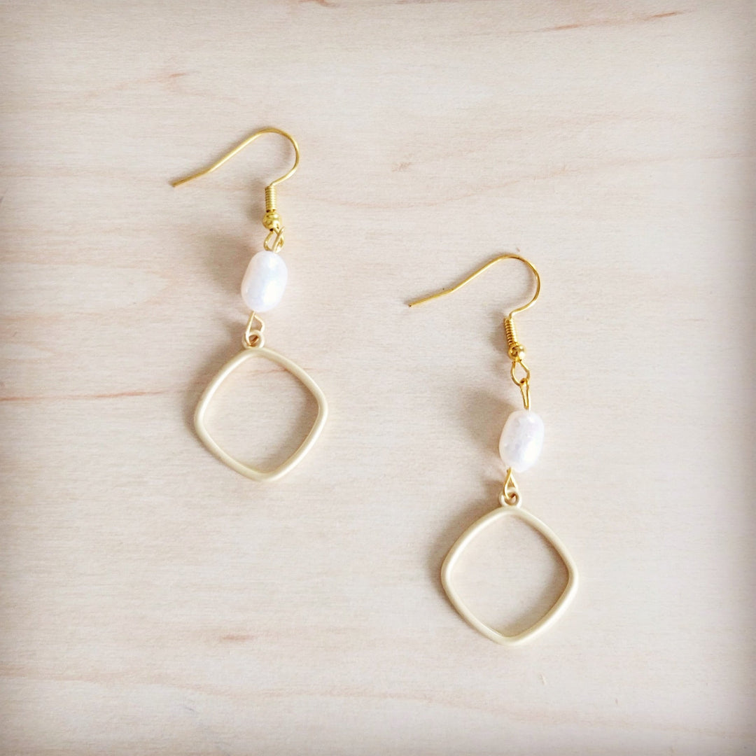 Matte gold freshwater pearl earrings with open square hoop and white pearl drops
