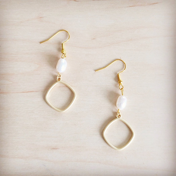 Matte gold freshwater pearl earrings with open square hoop and white pearl drops