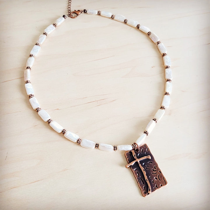 Freshwater pearl and copper-tone beaded necklace featuring antique cross pendant