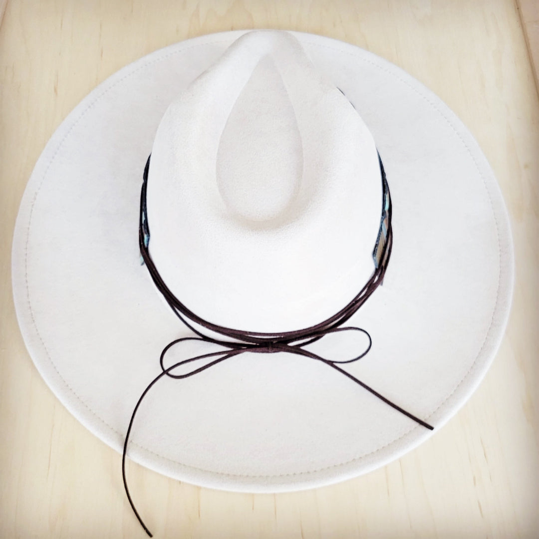 White felt wide-brim hat back with long black tie strings and band detail
