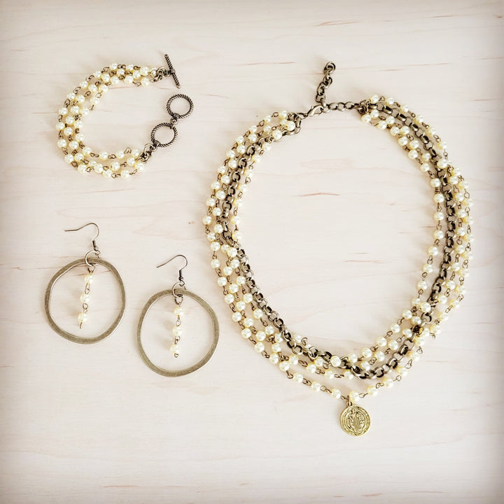 Copper hoop earrings with dangling champagne pearls