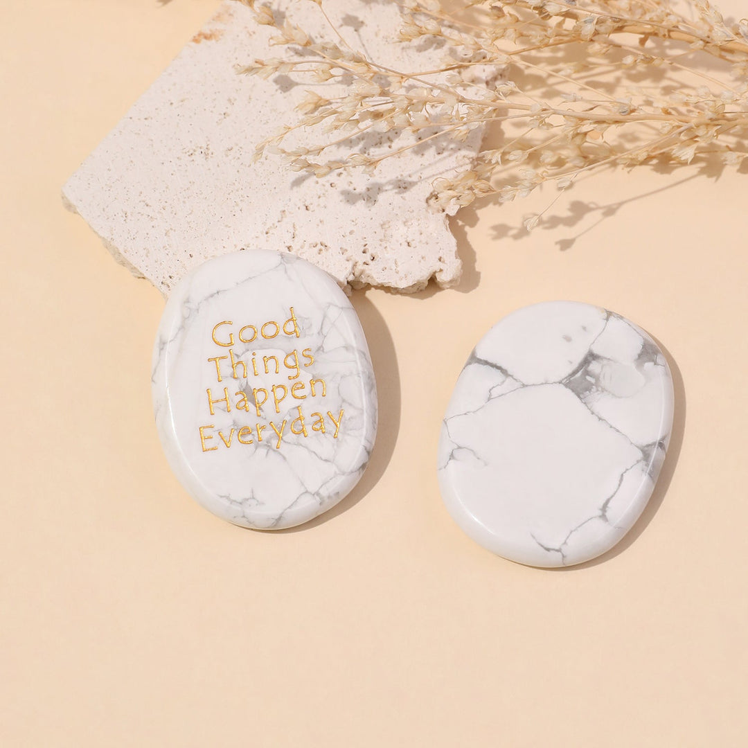 Set of two oval white marbled pocket crystal stones