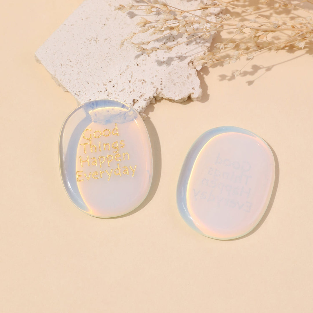 Light blue oval pocket crystal stone set, each with “Good Things Happen Everyday”