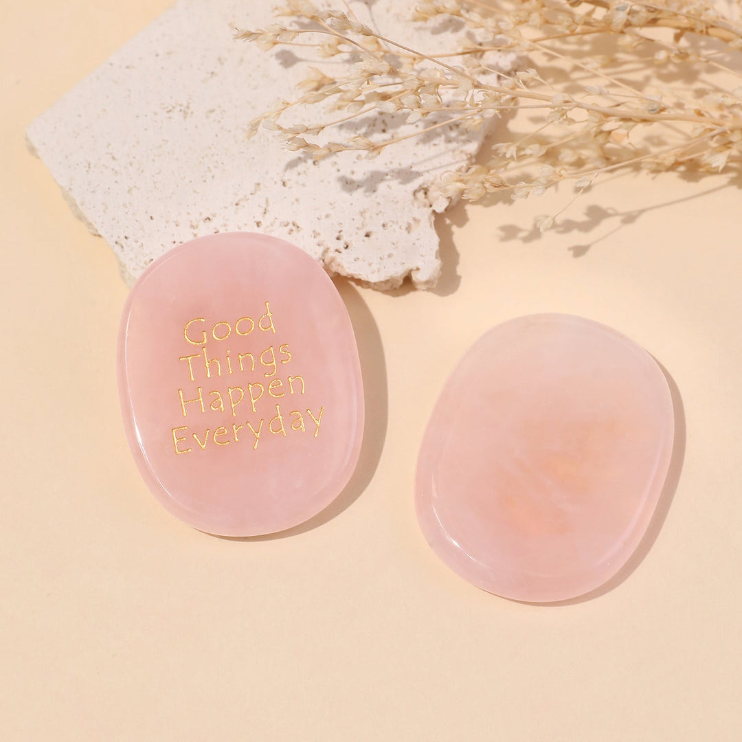 Pink oval pocket crystal stone set, each with “Good Things Happen Everyday”